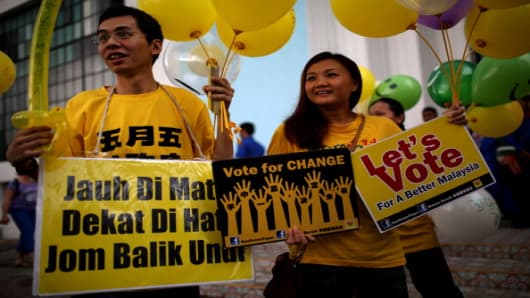 Supporters calling for electoral reform, ahead of the country's 13th general election this weekend.